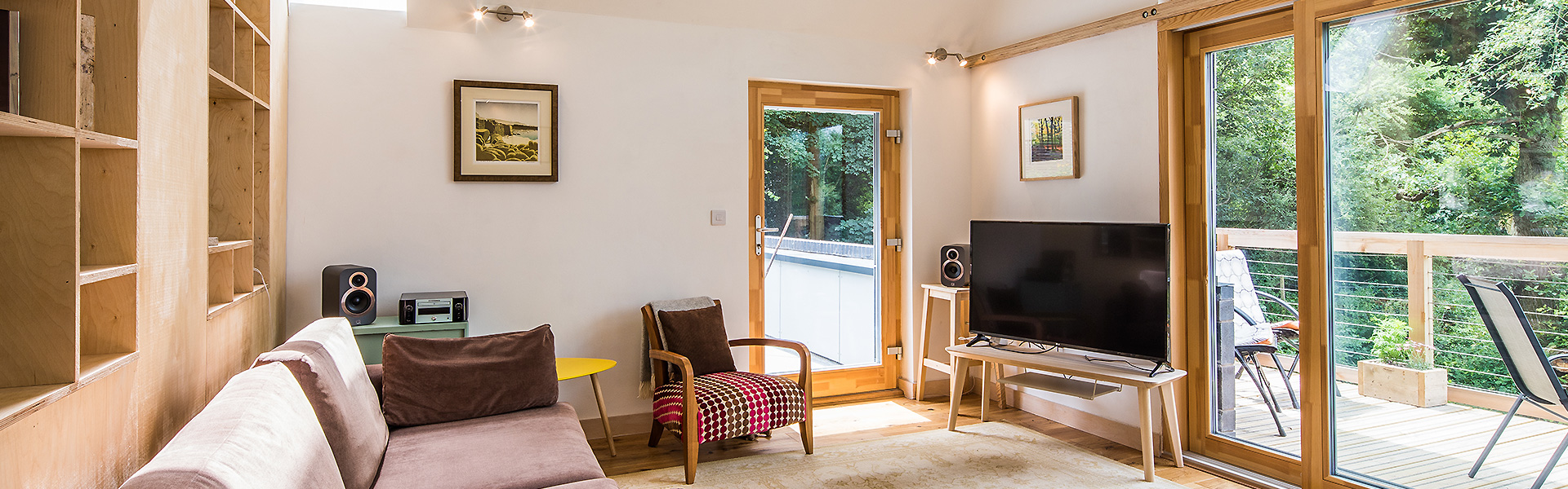 Living room with 21 Degrees french doors and windows