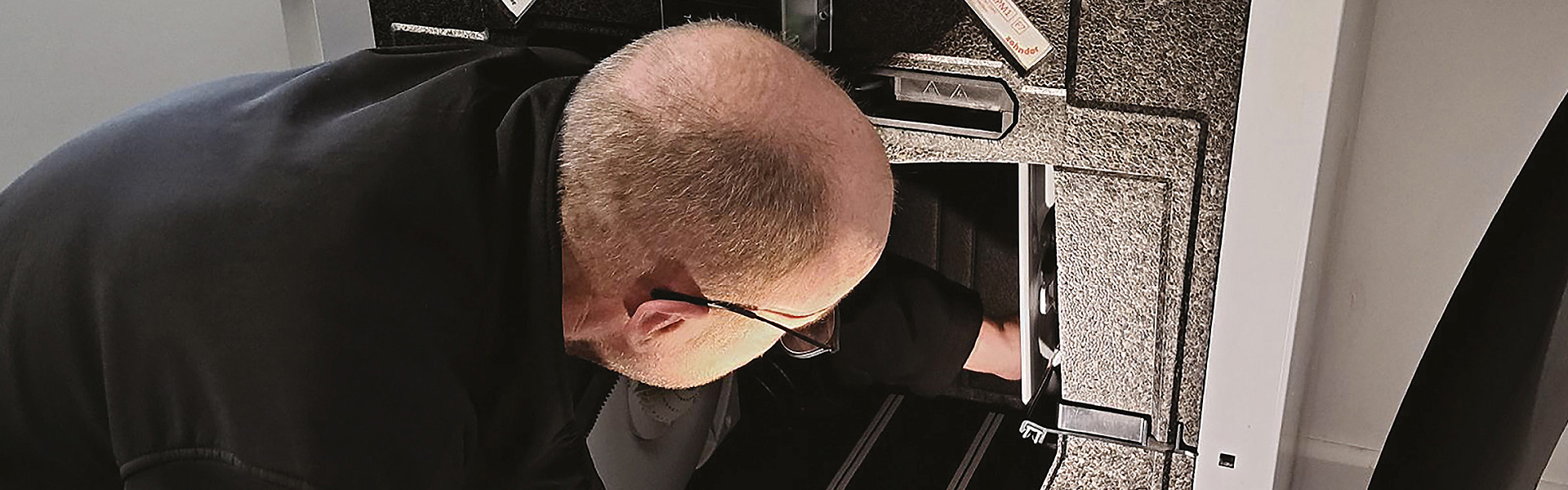 A man servicing an MVHR unit
